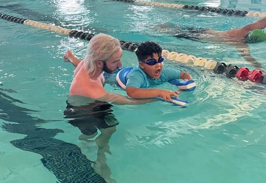 Largest-ever water safety class for our young patients takes place at Pods Swimming